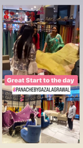 A collage of three photos showing people in a Panache clothing store handling large draped fabric pieces. The center photo has a pink text banner reading 'Great Start to the day @PANACHEBYGAZALAGRAWAL'.