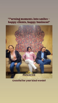 A promotional photo with text on a beige background showing three women sitting on a sofa in front of a large decorative wall piece. The text reads, "Turning moments into smiles—happy clients, happy business!" at the top and "PANACHE" with "Grateful for your kind words!!" at the bottom.