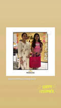 A social media-style photo from PANACHE showing a woman in a cream floral kurta standing next to a young girl in a pink t-shirt holding a bright pink shopping bag, set against a warm beige background with 'HAPPY CUSTOMER.' text.